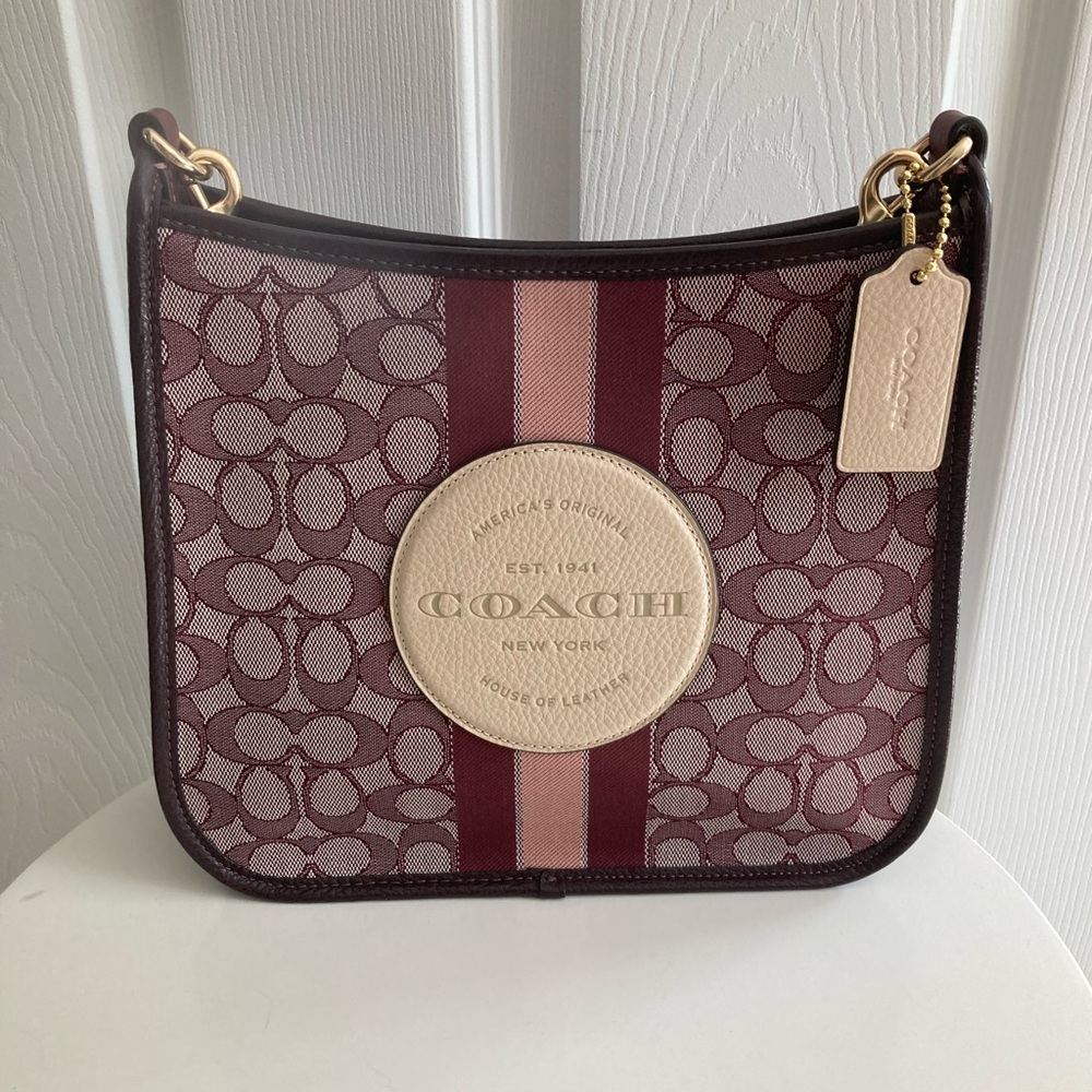 Coach Dempsey Crossbody bag burgundy / pink